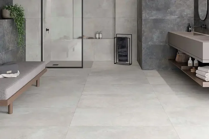 Fliese warme Betonoptik creme elfenbein 100×100 cm „Ferro Pearl“ matt rektifiziert